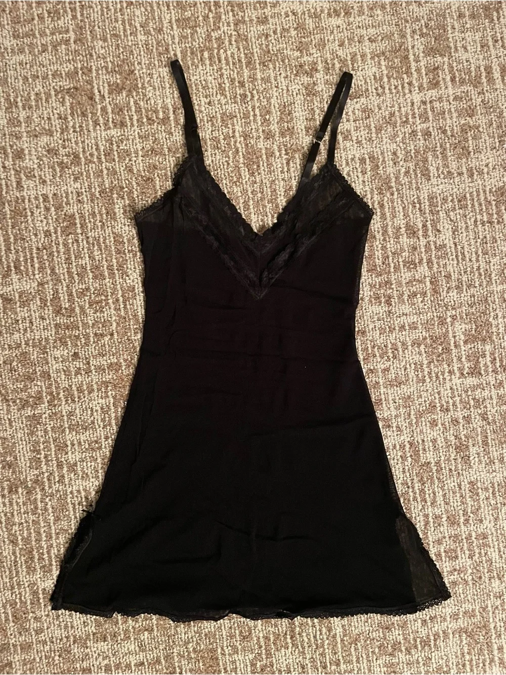 Sheer black negligeé with lace trim